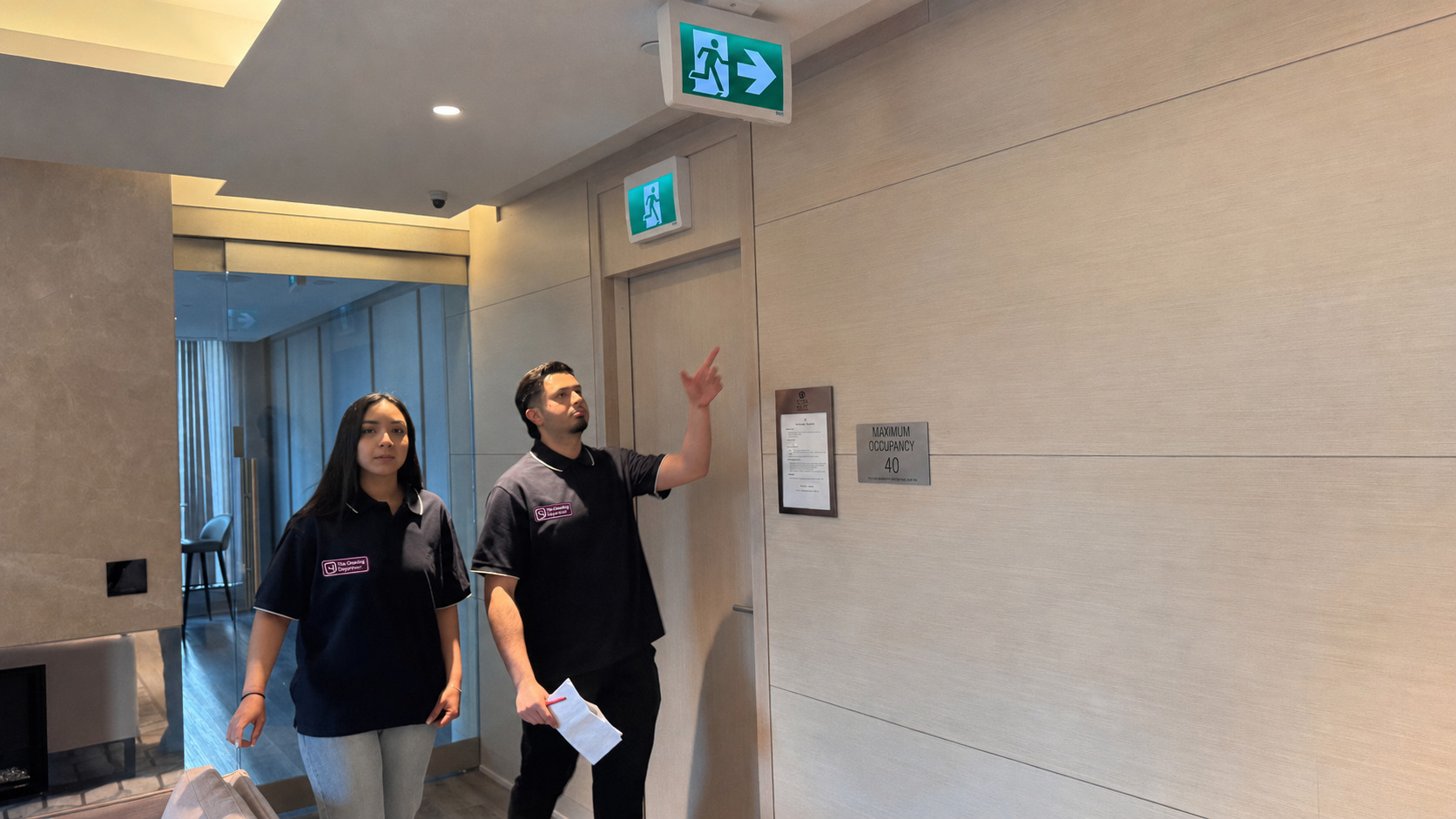 The Cleaning Department owners reviewing a job checklist